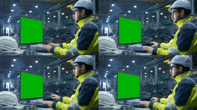 工程师在带有绿色模拟屏幕的个人电脑上工作