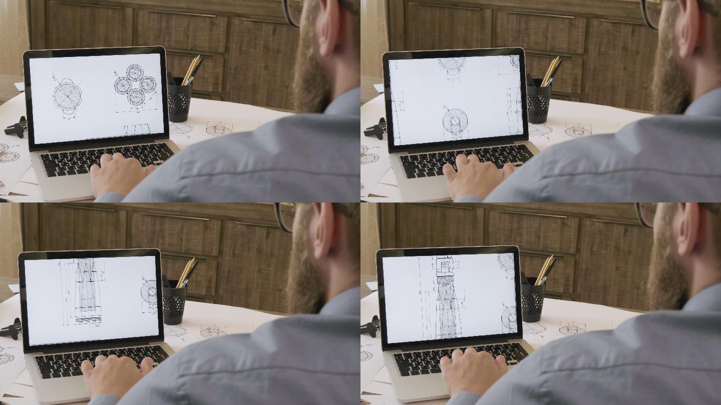 使用笔记本电脑查看图纸的工程师