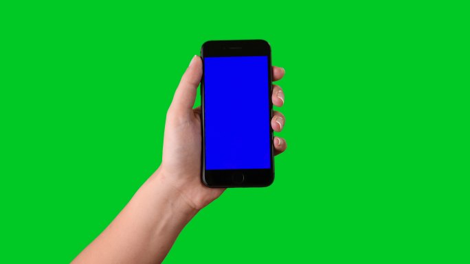 4k使用智能手机在绿色屏幕