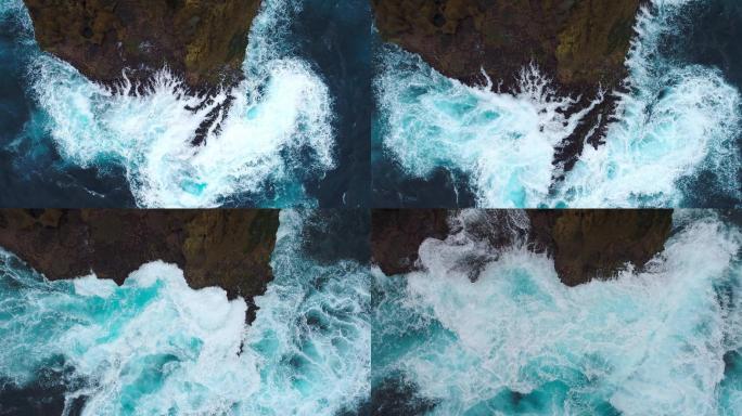 印度尼西亚，海浪冲击岩石海岸的悬崖。