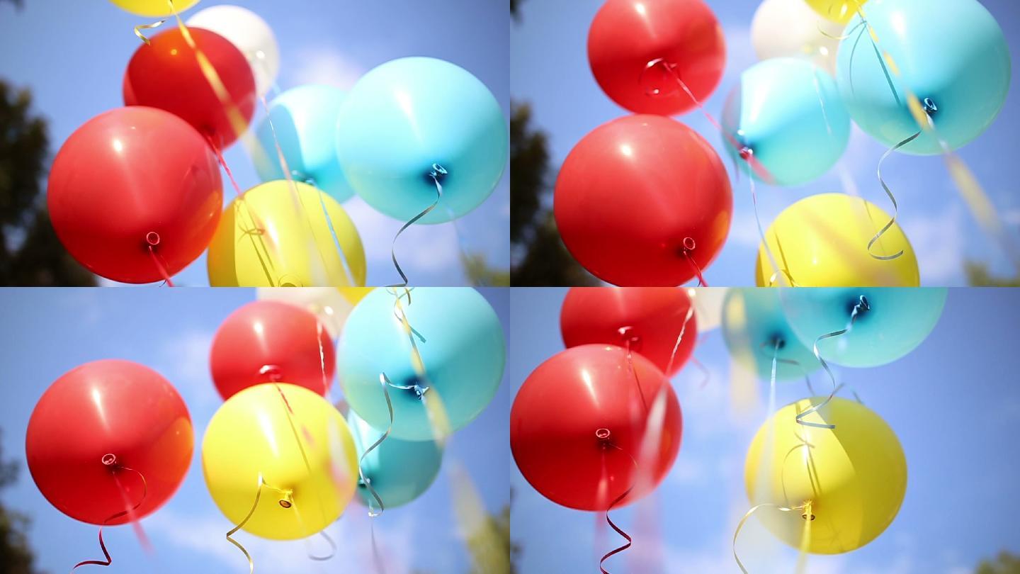 露天有许多五颜六色的气球