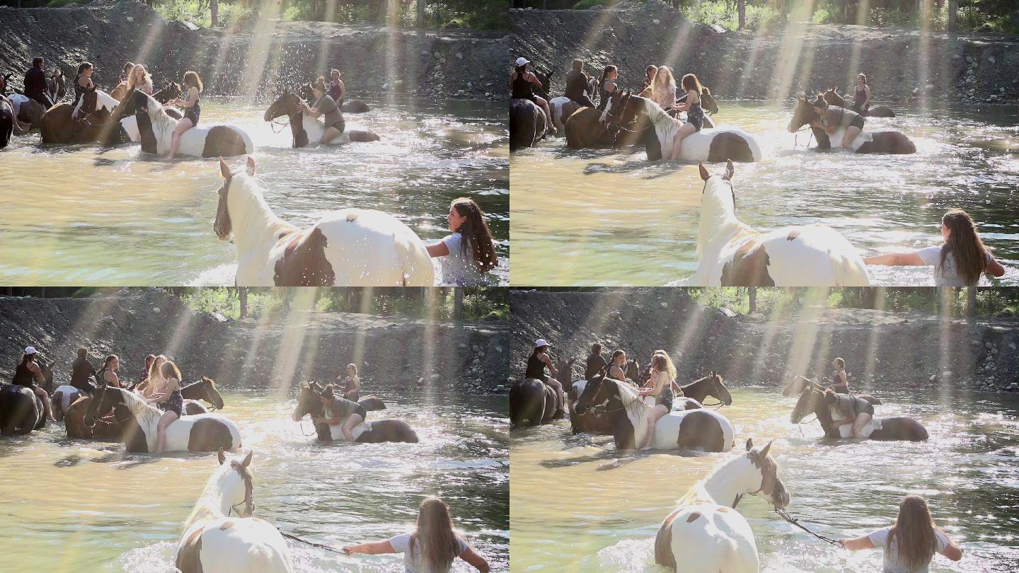 少女们在湖中骑马玩耍