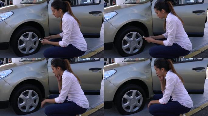 一位女士下了车，意识到自己的轮胎漏气了