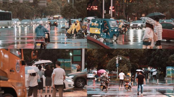 雨天十字路口行色匆匆的人