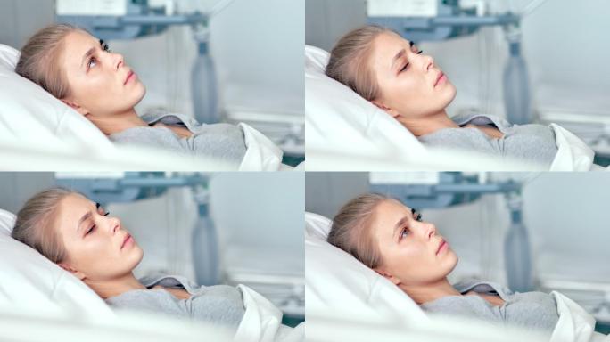 躺在病房里的年轻女病人。
