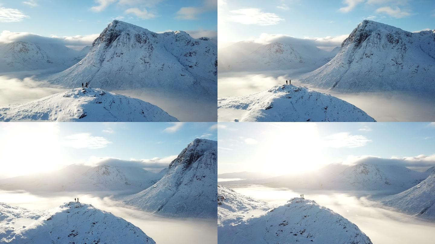 航拍雪山山峰山巅励志登山