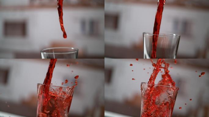 樱桃汁倒进玻璃杯。超慢动作