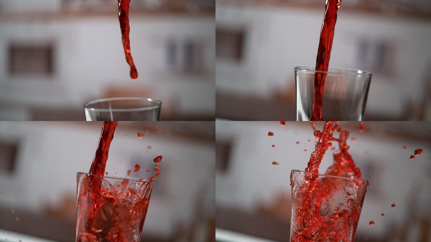 樱桃汁倒进玻璃杯。超慢动作