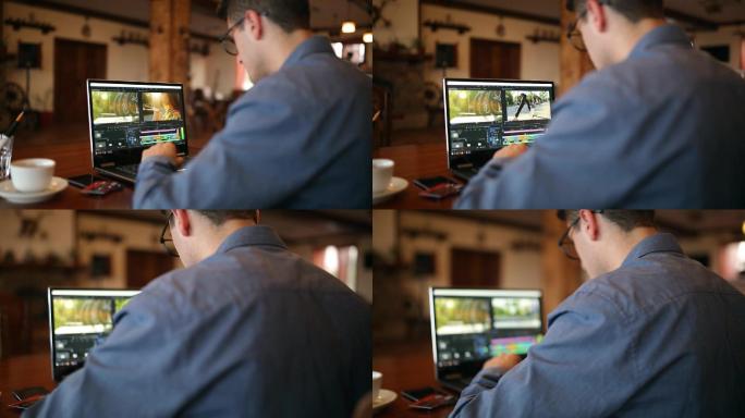 视频编辑师在笔记本电脑上使用电影编辑软件