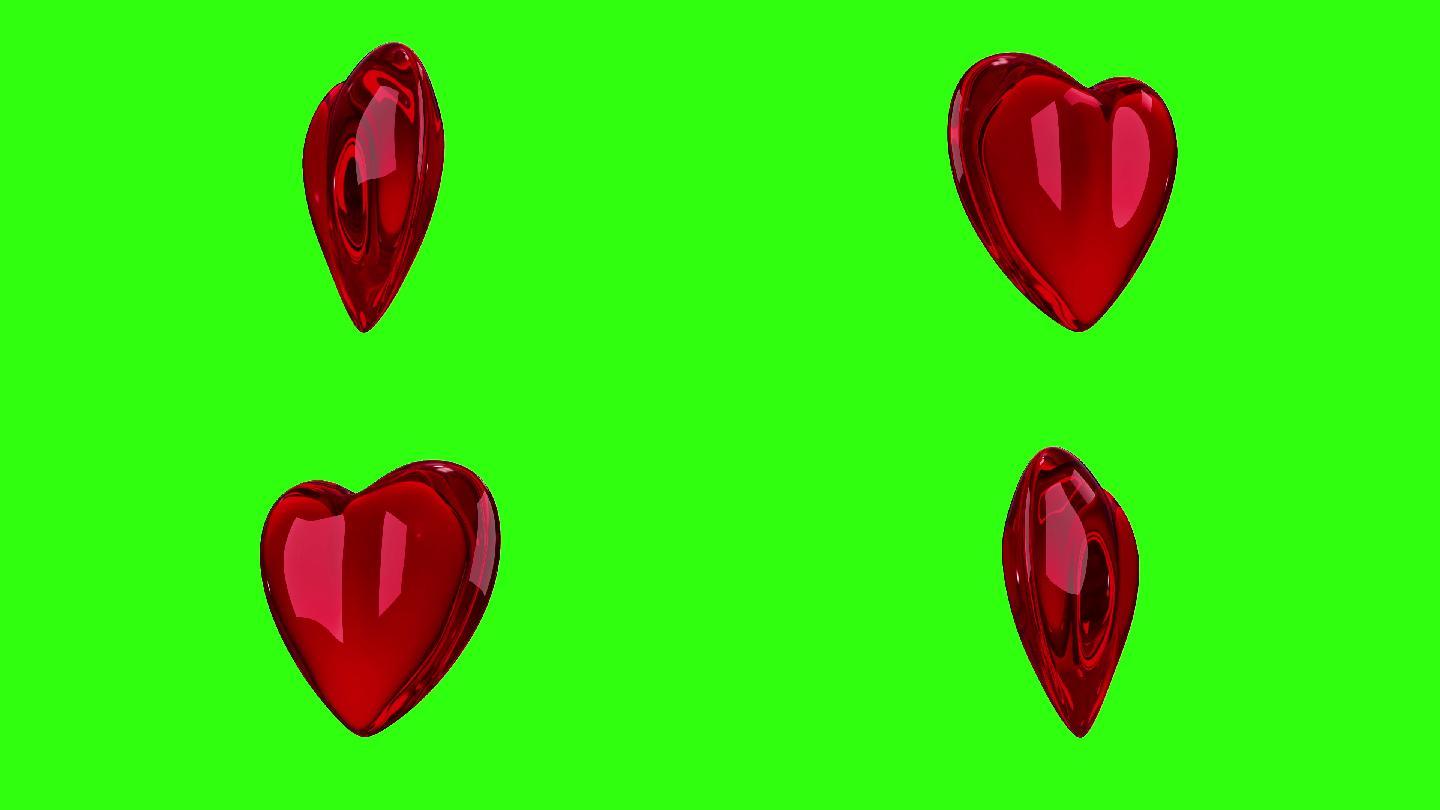 红色光泽3D心脏在绿色屏幕上旋转360度