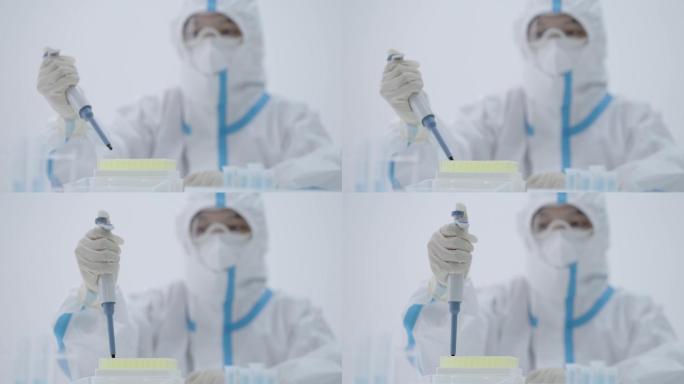 高科技医学人员使用移液器