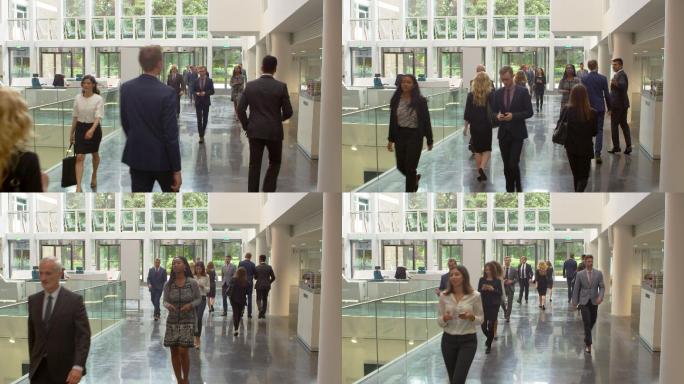 办公室大厅区域行走的商人