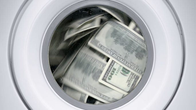 洗衣机滚筒里的美元
