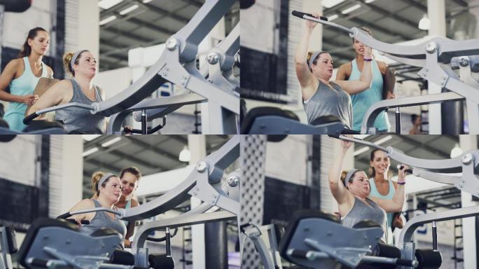 女子与私人教练在健身房锻炼的4K镜头