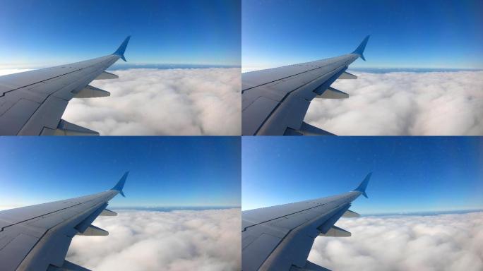 乘客视角在云层中的飞机机翼