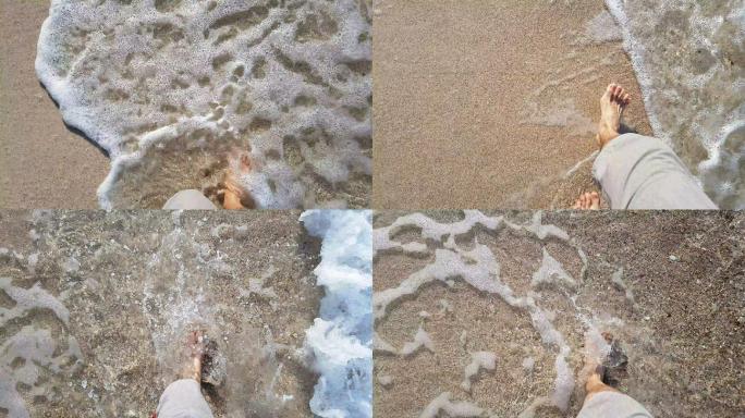 赤脚在海浪中行走海滩海洋浪水