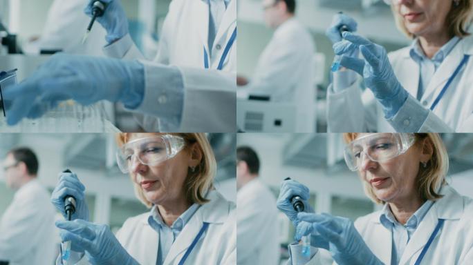 创新制药实验室的人员研究遗传学和药剂学