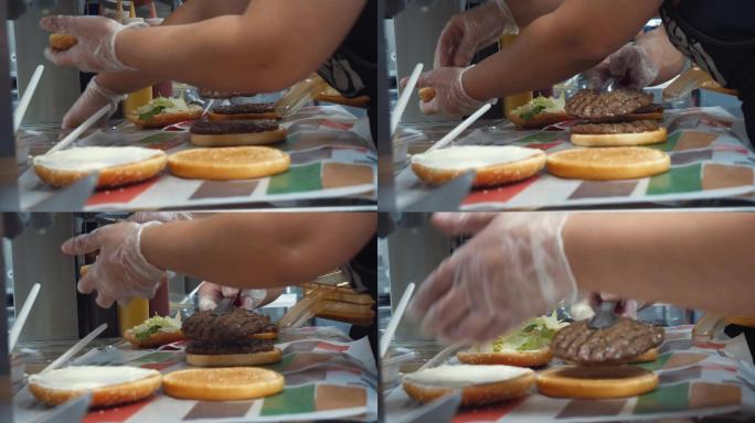 麦当劳员工烹饪经典汉堡包的特写镜头