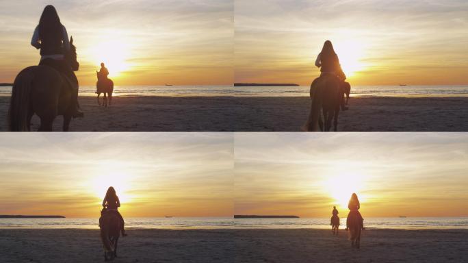夕阳下，在海滩上骑马的剪影