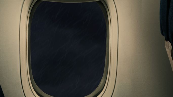 风暴穿过飞机窗口