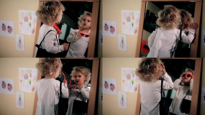 有趣小女孩在镜子前摆出姿势