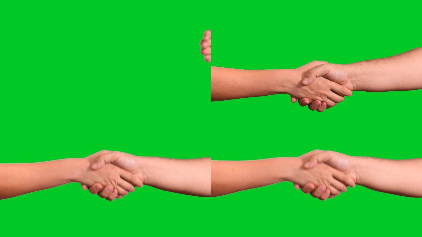 绿色背景前的握手合作会议签字合同白领商务