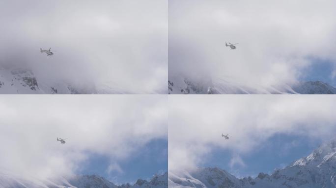 一架直升飞机飞越高山