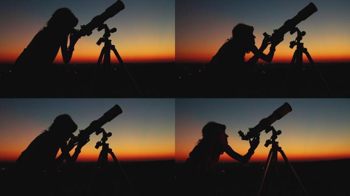 那个女孩用望远镜望着黄昏的天空。