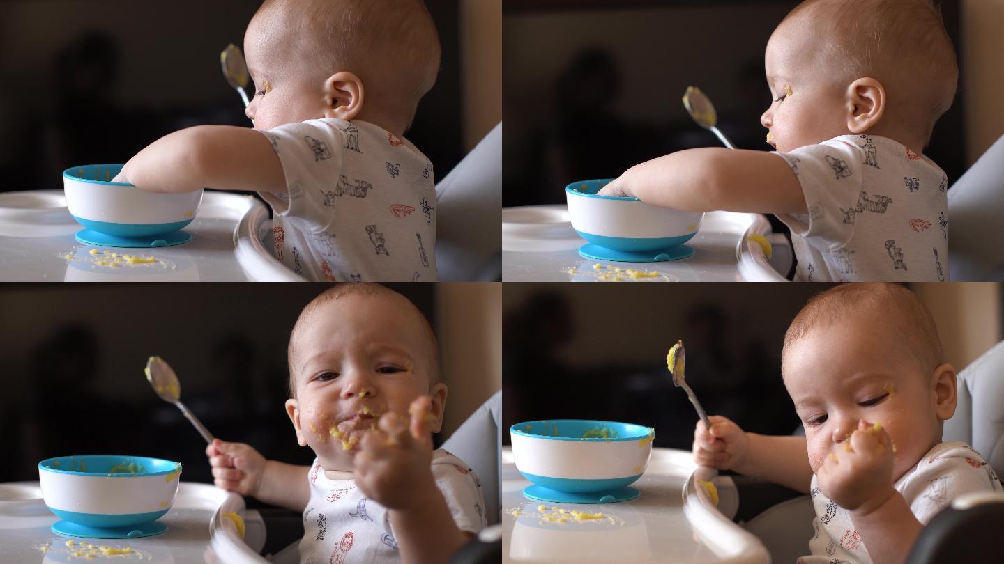 可爱的小男孩吃婴儿粥
