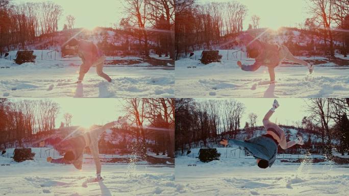 斯洛莫男孩在雪地里翻筋斗