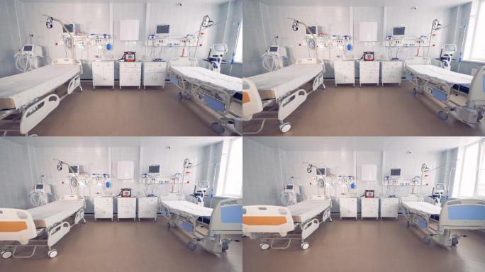 医院房间里有两张空床，里面有医疗设备