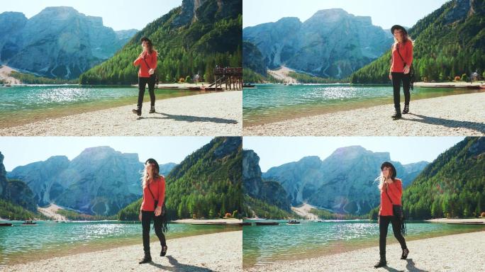 年轻女子漫步于白云石阿尔卑斯山意大利布雷斯湖