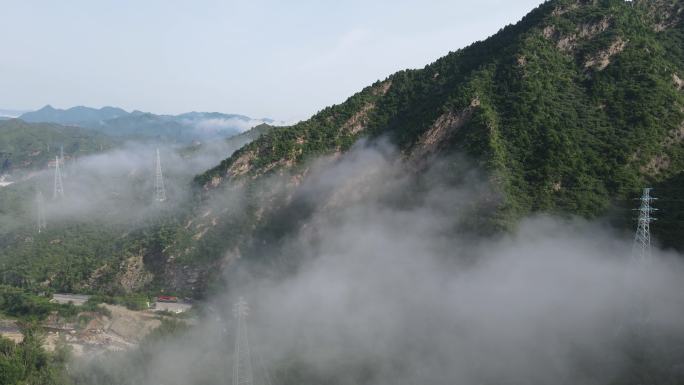 航拍北京密云山区云雾、电线杆塔