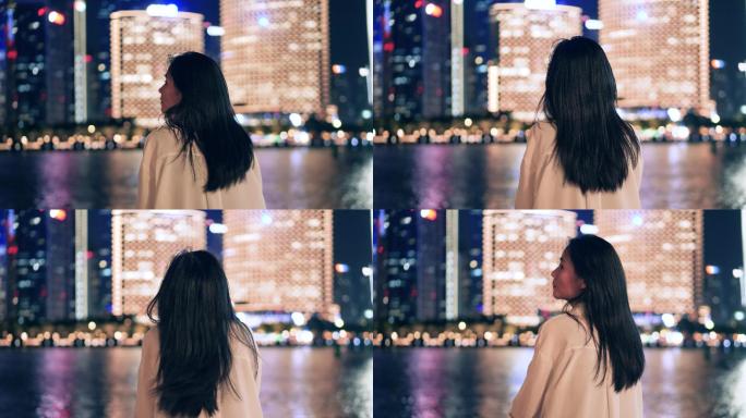 女孩在城市江边看风景的背影4k视频素材