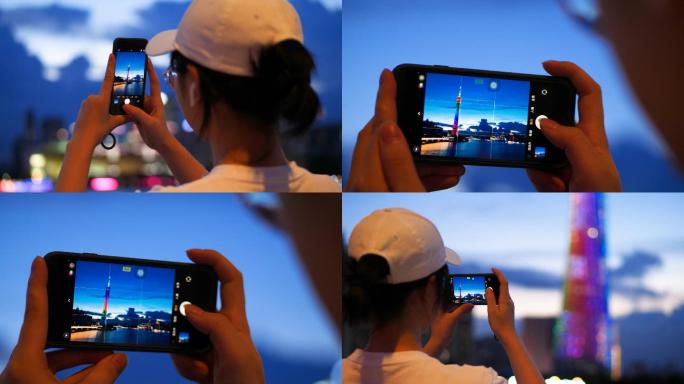 女孩在广州塔珠江边用手机拍照4k视频素材