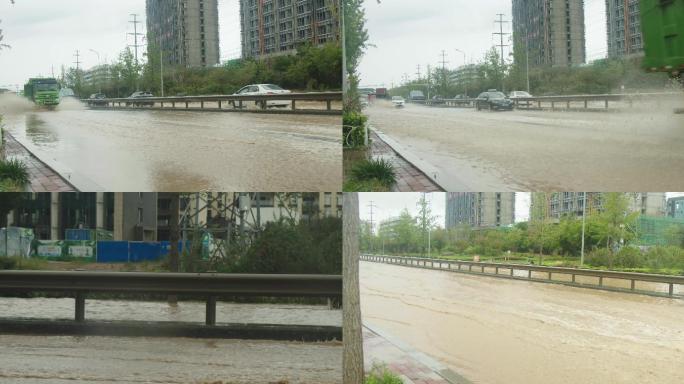 下雨马路积水，公交汽车溅水花