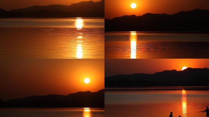 山湖之间金色太阳日落剪影一组