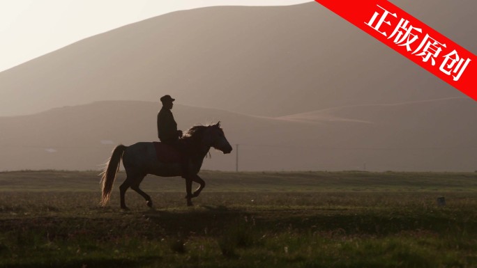 牧民骑马放羊