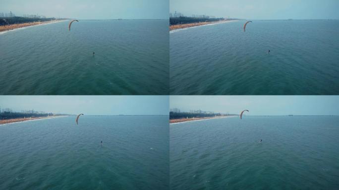 海岸线上滑翔伞冲浪