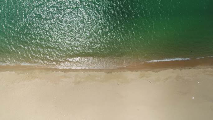 航拍海边沙滩南门海堤