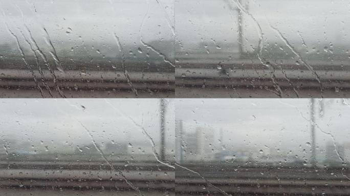 高铁窗外雨滴滑过