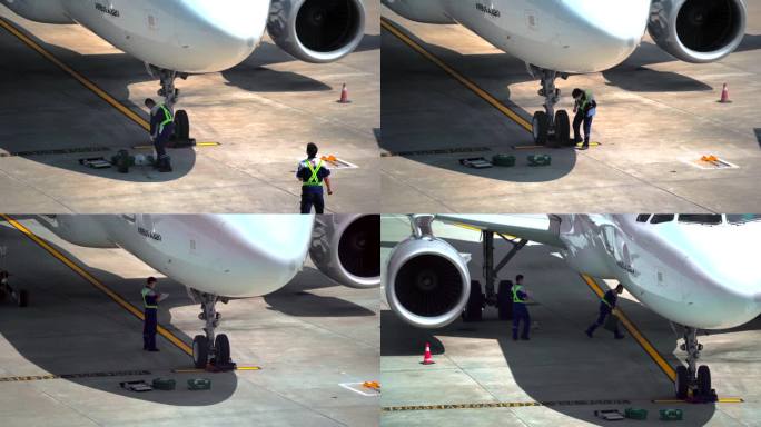 4K机场地勤机械师检测飞机空镜