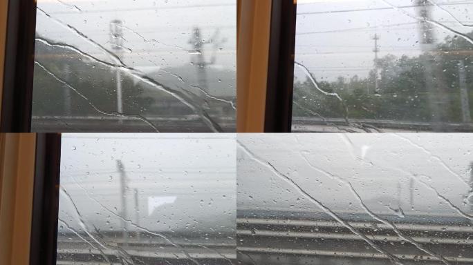 高铁窗外雨滴划过氛围