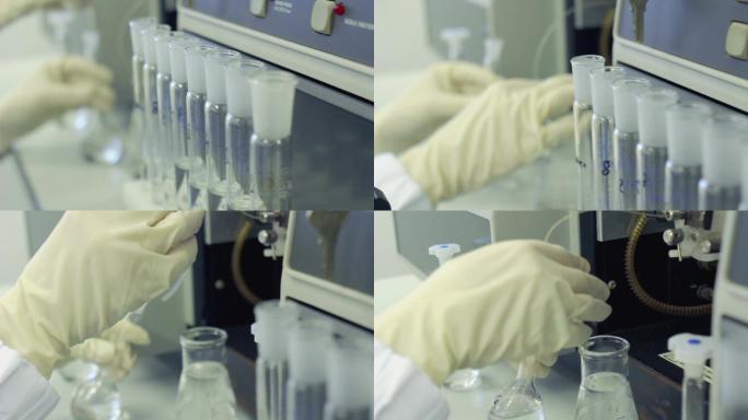 化学家使用烧瓶进行化学实验