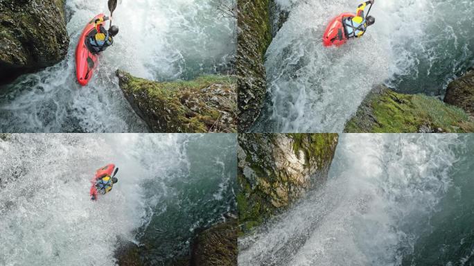 皮划艇上骑手在瀑布上滑落