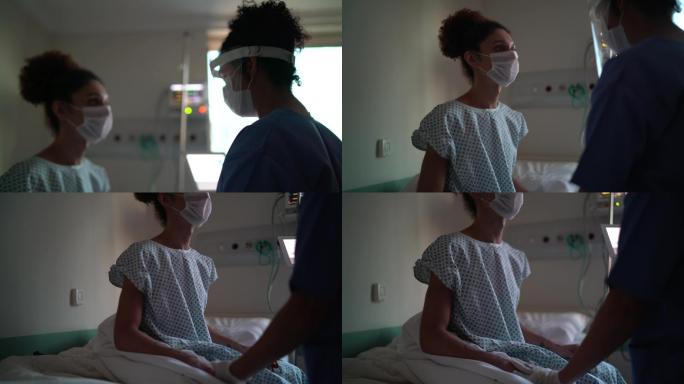 带口罩的医生和病人在病房