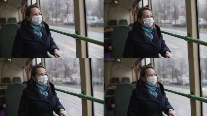巴士上戴防护面罩的女子