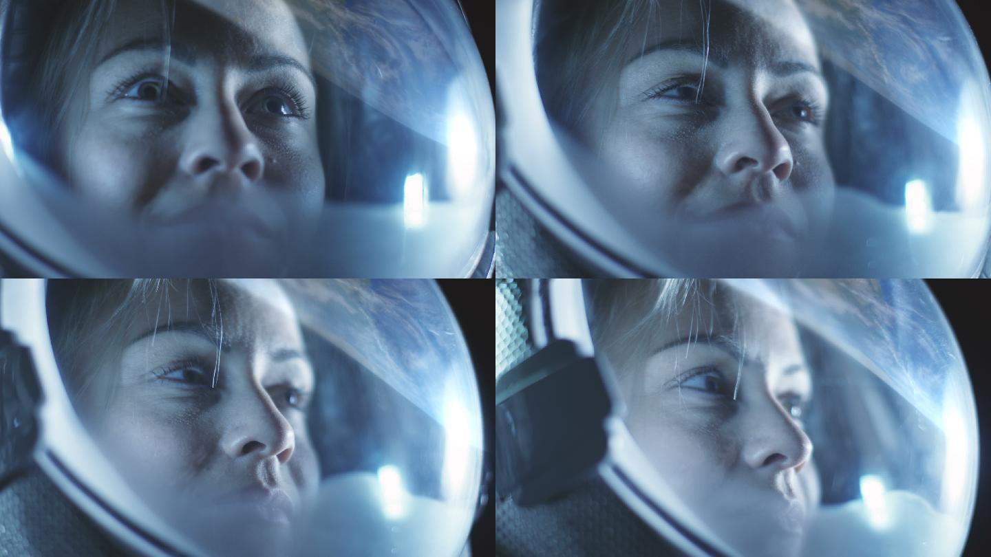 美丽的女宇航员在太空中穿着的肖像照