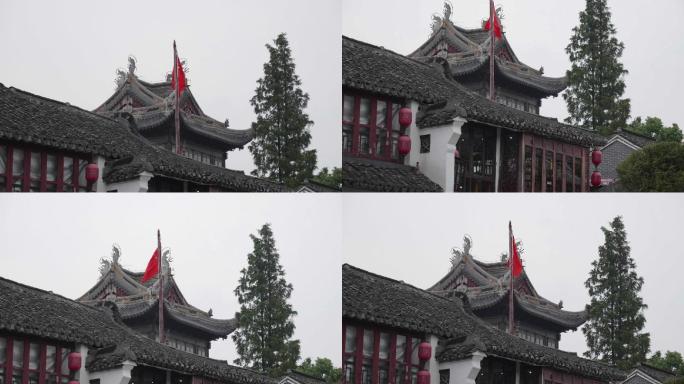 古镇寺庙边飘扬的国旗