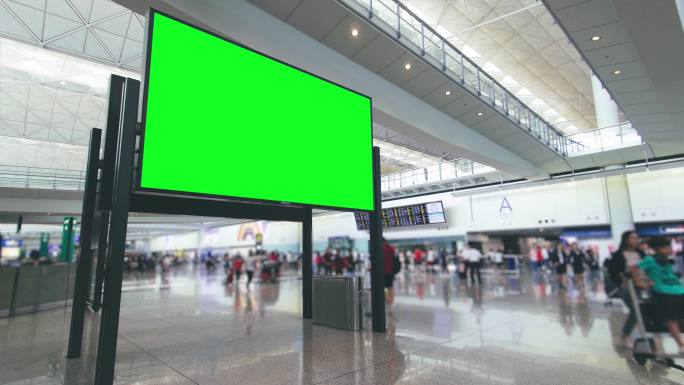 绿色屏幕的机场广告牌